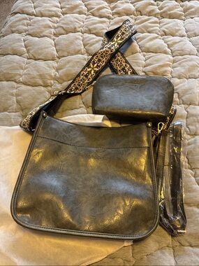 Stylish Black Crossbody Bag with Decorative Strap
